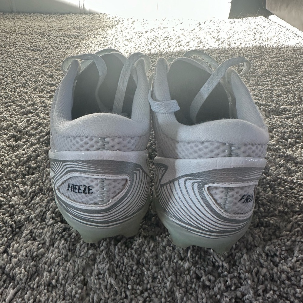 New Balance Silver and White lacrosse freeze cleats